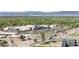 Aerial of shopping center with a variety of stores and ample parking in a bustling area at 4381 Dixon Dr, Westminster, CO 80031