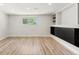 The finished basement features luxury vinyl plank flooring and built ins at 4381 Dixon Dr, Westminster, CO 80031