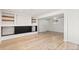 Finished basement has built ins and luxury vinyl plank flooring at 4381 Dixon Dr, Westminster, CO 80031