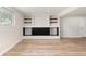 Finished basement showcasing the luxury vinyl plank flooring and built ins at 4381 Dixon Dr, Westminster, CO 80031