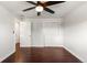 An empty bedroom features hardwood floors and a closet at 4381 Dixon Dr, Westminster, CO 80031