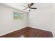 An empty bedroom features hardwood floors and a ceiling fan at 4381 Dixon Dr, Westminster, CO 80031