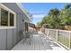 Back deck featuring ample space for outdoor dining and relaxation with table and chairs at 4381 Dixon Dr, Westminster, CO 80031