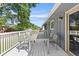 Back deck featuring ample space for outdoor dining and relaxation with a table and chairs at 4381 Dixon Dr, Westminster, CO 80031