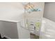 Bright entryway featuring a modern light fixture and a view of the front door at 4381 Dixon Dr, Westminster, CO 80031
