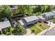 Beautifully maintained two-story home featuring a lush green lawn and mature trees at 4381 Dixon Dr, Westminster, CO 80031