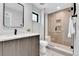 Modern bathroom featuring a glass enclosed shower and a sleek vanity at 2162 S Ash St, Denver, CO 80222