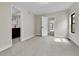 Neutral toned bedroom with ensuite bath, and hallway views through open doors; window present at 2162 S Ash St, Denver, CO 80222
