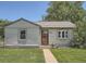 Charming home featuring a well-maintained lawn and inviting curb appeal at 1140 S Xavier St, Denver, CO 80219