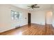Bright living room featuring hardwood floors, bay window, and natural light at 1140 S Xavier St, Denver, CO 80219