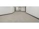 Spacious basement with neutral carpet and multiple doorways, offering versatile living space at 965 W 96Th Ave, Thornton, CO 80260