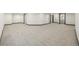 Expansive basement with neutral carpet and multiple doorways, offering versatile living space at 965 W 96Th Ave, Thornton, CO 80260