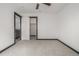 Cozy bedroom with plush carpet and a ceiling fan, providing a comfortable living space at 965 W 96Th Ave, Thornton, CO 80260
