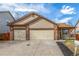 Charming home featuring a well-manicured lawn, front porch, and a convenient two-car garage at 965 W 96Th Ave, Thornton, CO 80260
