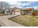 Charming single-Gathering home featuring a well-manicured lawn and a convenient two-car garage at 965 W 96Th Ave, Thornton, CO 80260