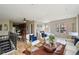 Spacious living area is open to kitchen with hardwood floors and lots of natural light at 3195 Blake St # 106, Denver, CO 80205