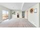 Bright basement with sliding doors leading to the backyard, and a dartboard at 8408 Vinegarroon Rd, Parker, CO 80138