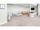 Finished basement with seating area and play space at 8408 Vinegarroon Rd, Parker, CO 80138