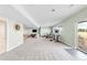 Finished basement showcasing a rec room, home office space and access to backyard at 8408 Vinegarroon Rd, Parker, CO 80138