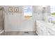 Elegant bathroom with double vanity and a view at 8408 Vinegarroon Rd, Parker, CO 80138