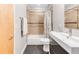 Bathroom with tub, shower, and updated vanity at 8408 Vinegarroon Rd, Parker, CO 80138