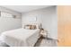 Cozy bedroom with a queen-size bed and nightstand at 8408 Vinegarroon Rd, Parker, CO 80138