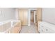 Bedroom with crib, dresser, closet, and window views at 8408 Vinegarroon Rd, Parker, CO 80138