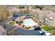 Community shot of multi-Gathering homes with pool and parking at 1811 S Quebec Way # 103, Denver, CO 80231