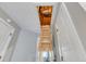 A functional attic access features a retractable ladder for easy access to additional storage space at 1811 S Quebec Way # 103, Denver, CO 80231