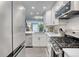 Updated kitchen boasts stainless steel appliances and plenty of counter space at 1811 S Quebec Way # 103, Denver, CO 80231