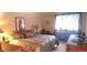 Cozy primary bedroom with warm lighting and soft carpet at 12592 E Cornell Cir, Aurora, CO 80014