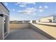 Private rooftop deck with mountain views and tile flooring at 5215 Queen Ct, Arvada, CO 80002