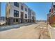 Modern townhouses with brick facade and attached garages at 9055 Westminster Blvd, Westminster, CO 80031