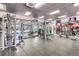 Spacious gym with a variety of weight machines, mirrored walls, and ample space for diverse workout routines at 601 W 11Th Ave # 1101, Denver, CO 80204