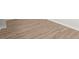 Close-up of sleek, modern hardwood flooring with a light finish and clean lines at 21202 E 63Rd Dr, Aurora, CO 80019