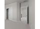 Bright hallway with a bedroom and closet leading to the stairwell at 21202 E 63Rd Dr, Aurora, CO 80019