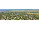 Panoramic aerial view showcasing the neighborhood's lush greenery and surrounding landscape at 14185 W Warren Cir, Lakewood, CO 80228