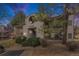 Inviting exterior view of a multi-story condo building with balconies and manicured landscaping at 9680 Brentwood Way # 202, Broomfield, CO 80021