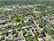 Aerial view showcasing the property's location within a well-treed residential neighborhood at 3871 Moore St, Wheat Ridge, CO 80033