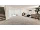 Basement living room provides ample space for relaxation and Gathering activities at 3871 Moore St, Wheat Ridge, CO 80033