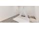 Cozy bedroom nook with a teepee and decorative poufs on soft carpeting at 3871 Moore St, Wheat Ridge, CO 80033