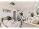 Spacious living room with comfortable seating, modern decor, and lots of natural light at 3871 Moore St, Wheat Ridge, CO 80033