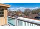 Rooftop deck view featuring downtown skyline views and an outdoor access door at 1321 E 10Th Ave # 4, Denver, CO 80218