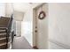 Hallway with staircase and unit 4 front door at 1321 E 10Th Ave # 4, Denver, CO 80218
