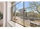 Window with a view of the street and mature trees outside at 1321 E 10Th Ave # 4, Denver, CO 80218