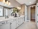 Stylish bathroom with double vanity, contemporary lighting, and modern fixtures throughout at 18940 E 96Th Pl, Commerce City, CO 80022