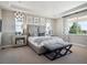 Beautiful bedroom with decorative wall coverings and ample natural light from the large window at 18940 E 96Th Pl, Commerce City, CO 80022