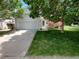 Charming two-story home with a well-maintained lawn and an attached two-car garage at 5966 S Winnipeg St, Aurora, CO 80015