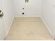 Laundry room with tile floor with water hookups ready for a washer and dryer at 5966 S Winnipeg St, Aurora, CO 80015