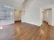 Spacious living room with hardwood floors, tall ceilings, and a staircase at 5966 S Winnipeg St, Aurora, CO 80015
